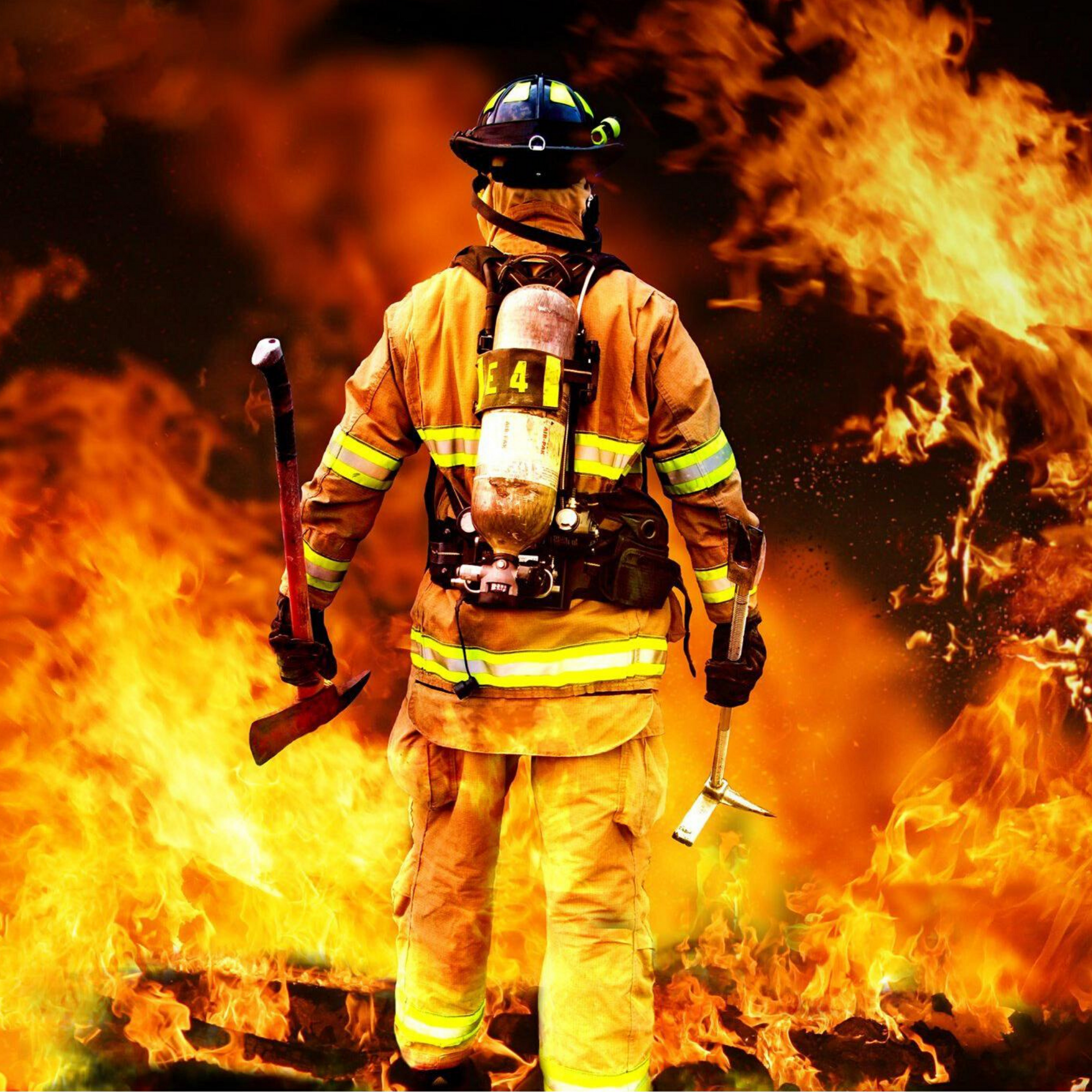 Fireman in front of fire